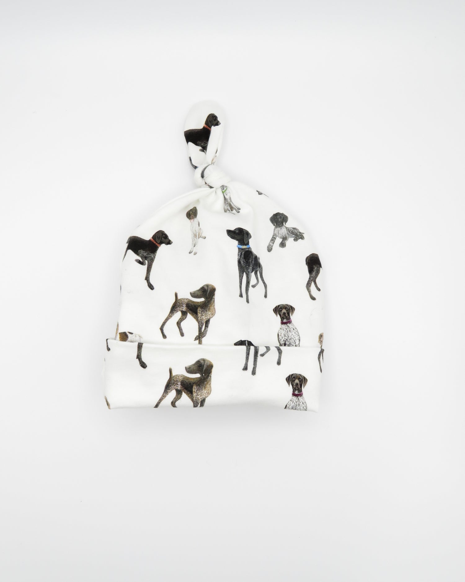 Unisex newborn hat with German Shorthaired Pointer printed on soft white fabric. Designed for newborn comfort.