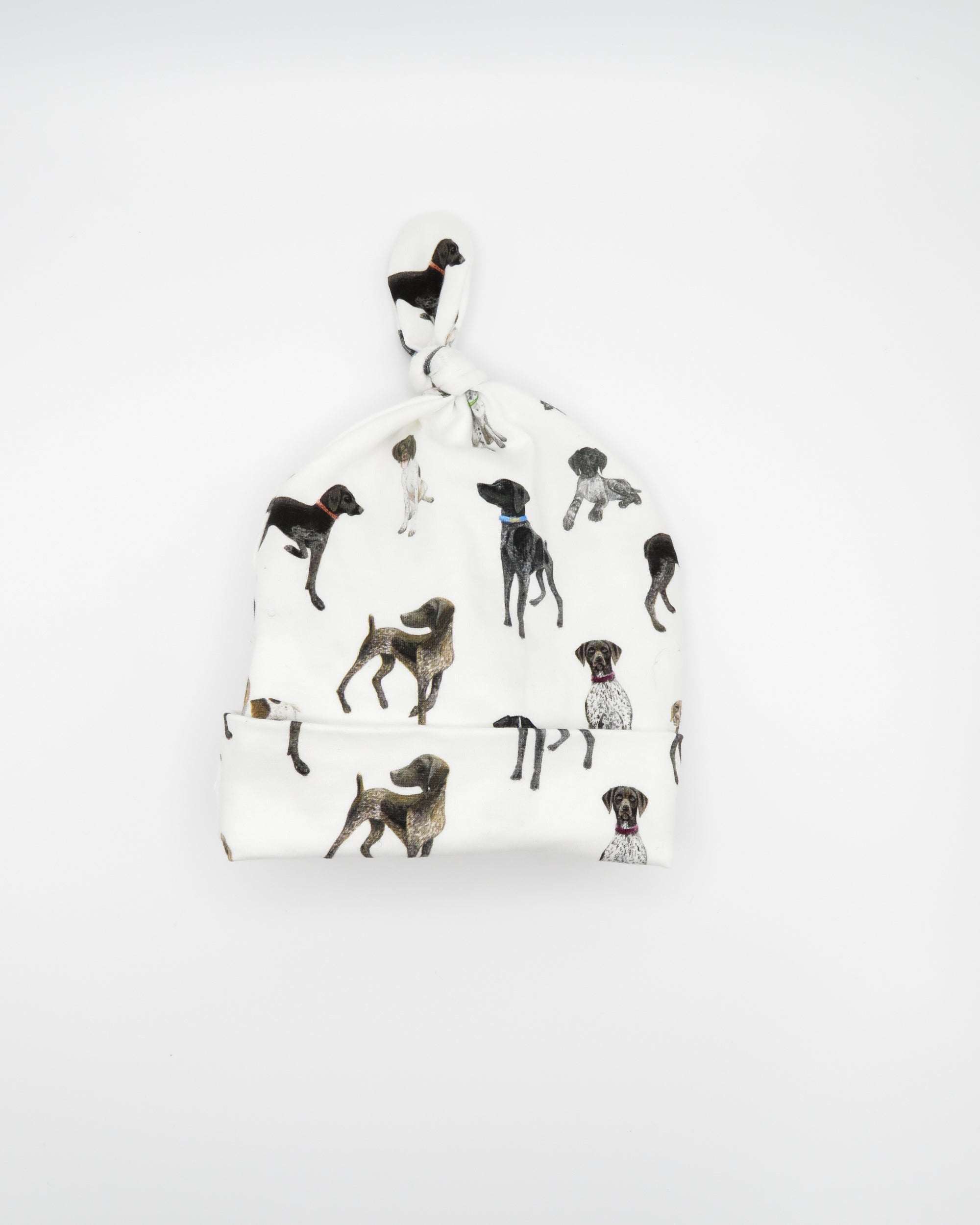 Unisex newborn hat with German Shorthaired Pointer printed on soft white fabric. Designed for newborn comfort.