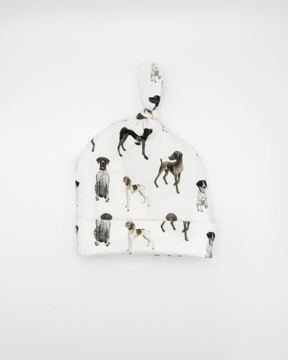 Unisex newborn hat with German Shorthaired Pointer printed on soft white fabric. Designed for newborn comfort.