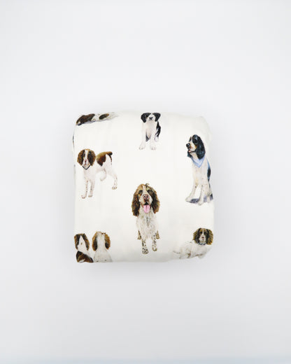 Soft Springer Spaniel print crib sheet for baby nursery. Hypoallergenic and breathable crib bedding. Springer Spaniel dogs printed on soft white fabric.