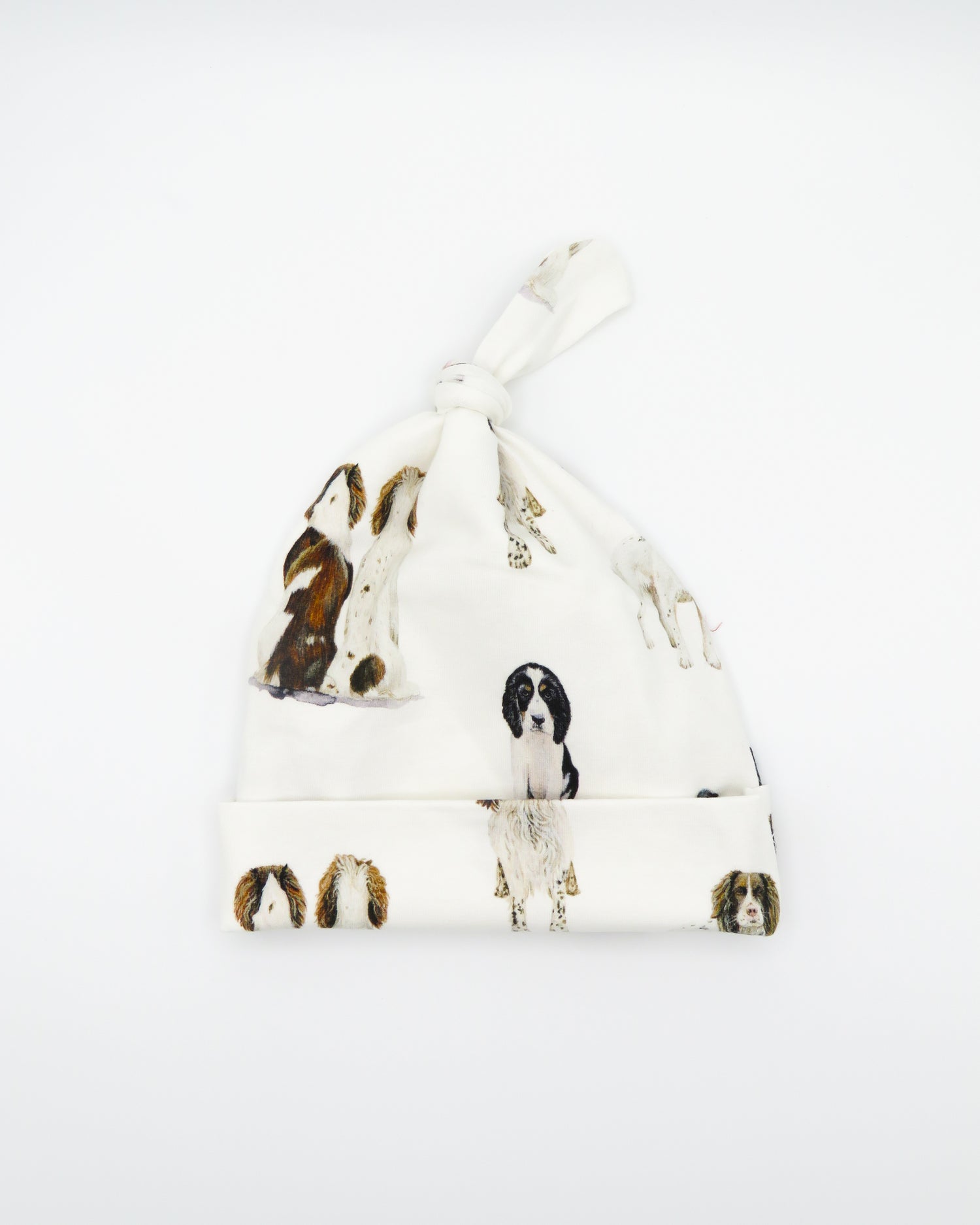 Springer Spaniels printed on soft white fabric. Cute dog-themed Newborn hat for boys and girls. Perfect addition to your newborn outfit.