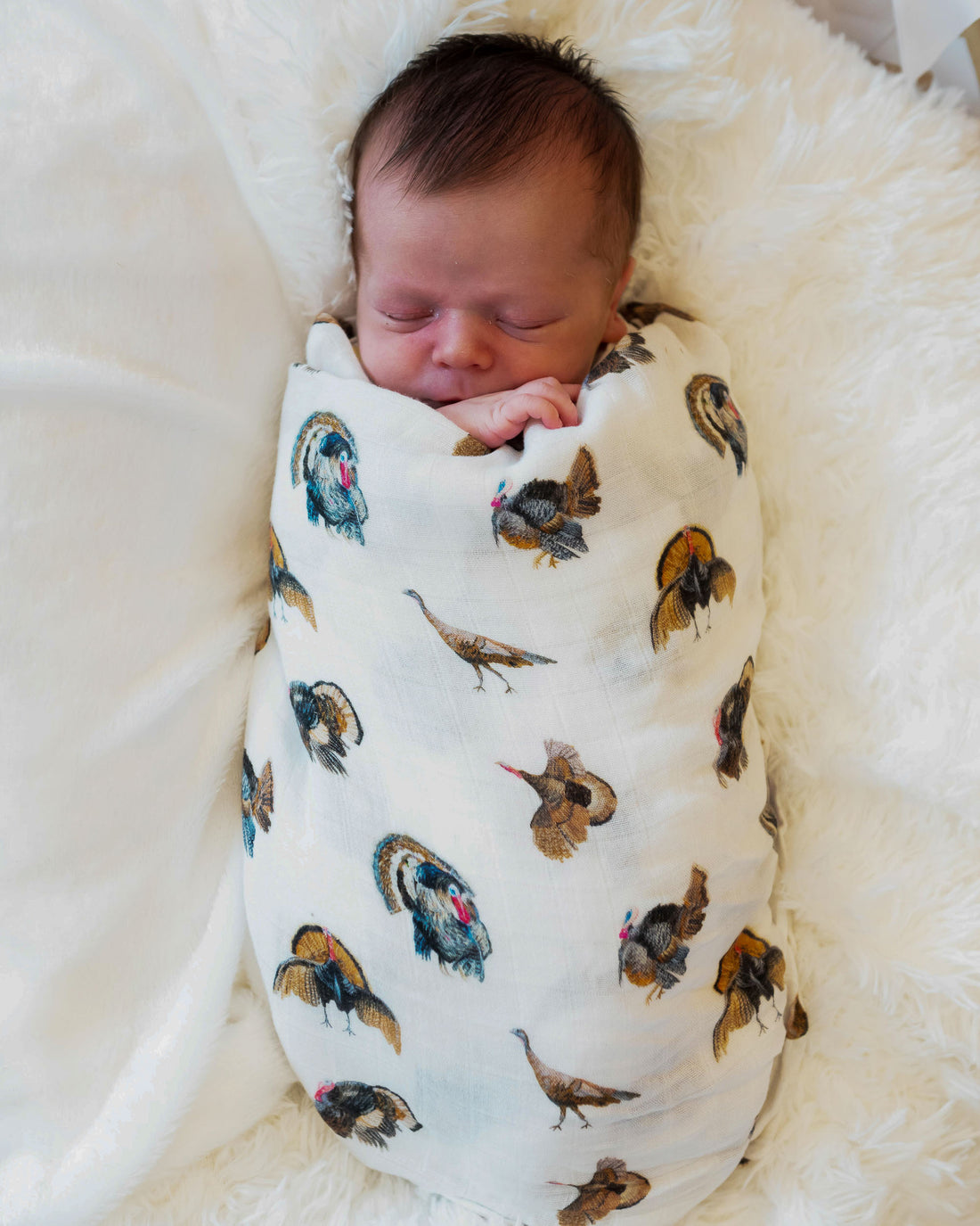 Soft and comfy turkey trot print baby blanket made from organic cotton and bamboo.