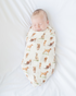 Vizsla print baby swaddle blanket. Gender-neutral dog-themed swaddle for newborns