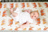 Easy Tiger crib sheet featuring a playful tiger print on soft jersey cotton fabric for baby nurseries.