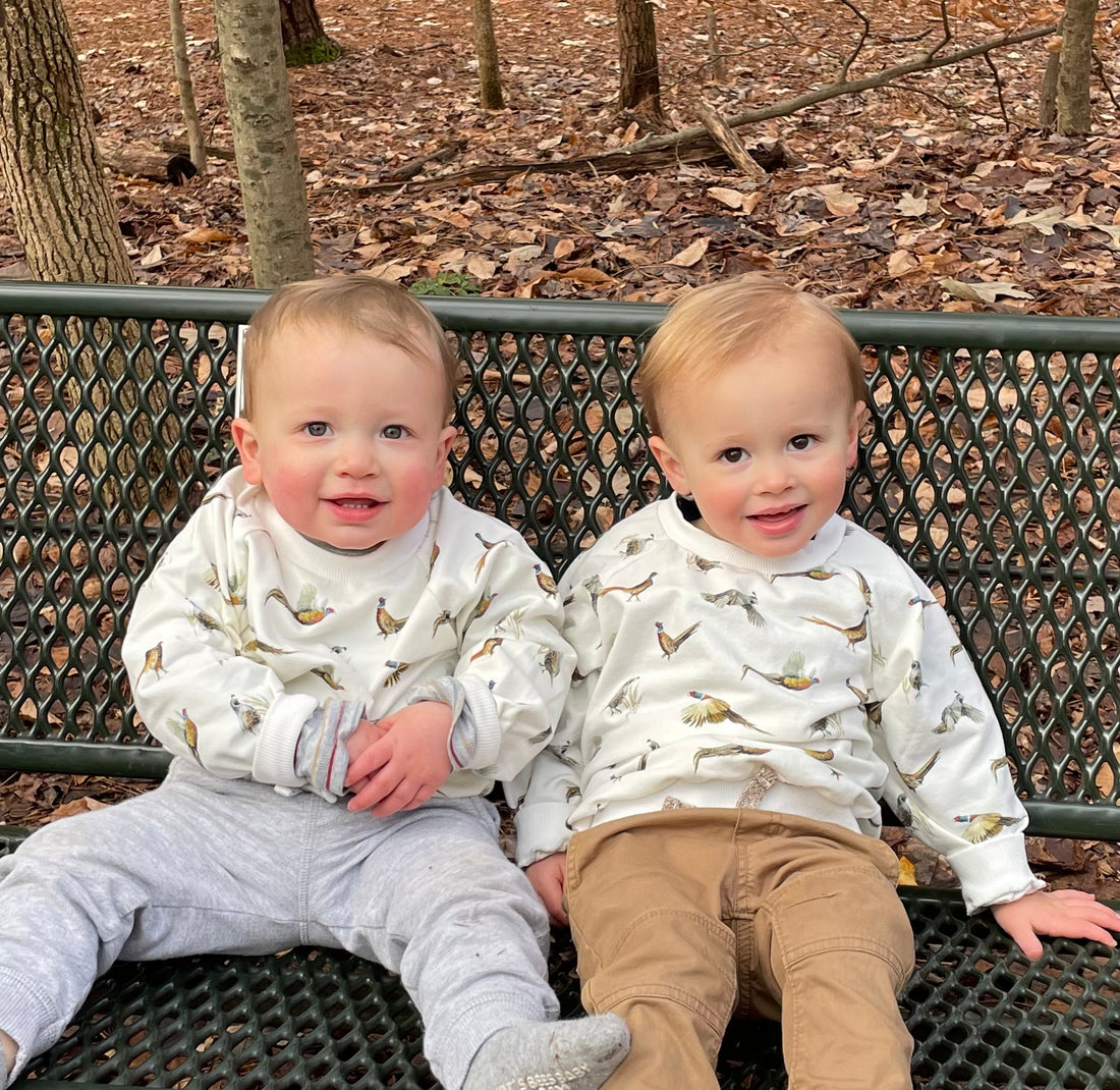 Pheasants and Quail Drop-Sleeve Top – Made from 100% organic white fabric, cozy and soft for kids, perfect for indoor or outdoor adventures with a relaxed fit. Worn by young boys outdoors.