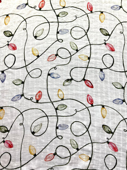 Christmas swaddle with a vintage Christmas lights pattern.